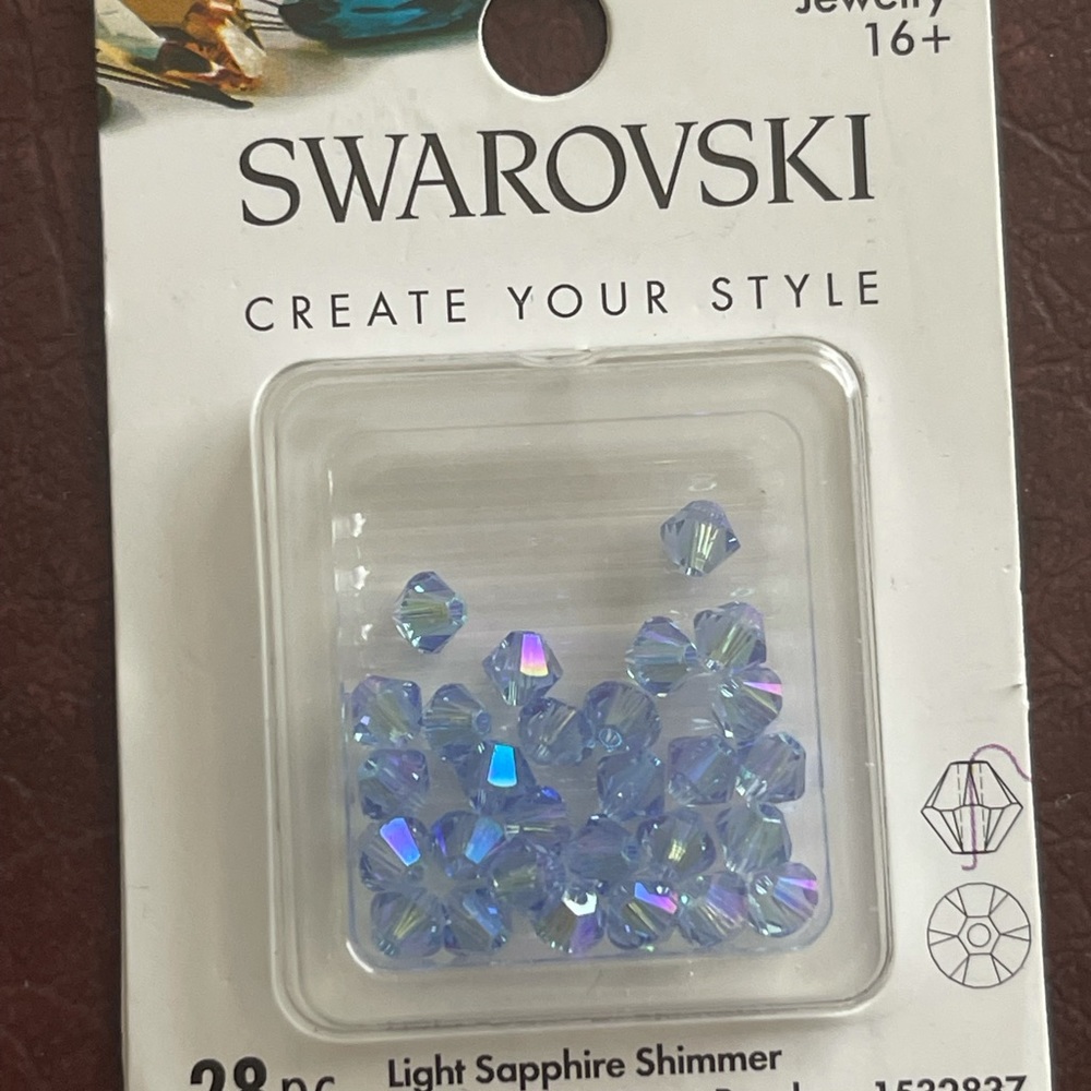 Light sapphire shimmer purple Swarovski beads
